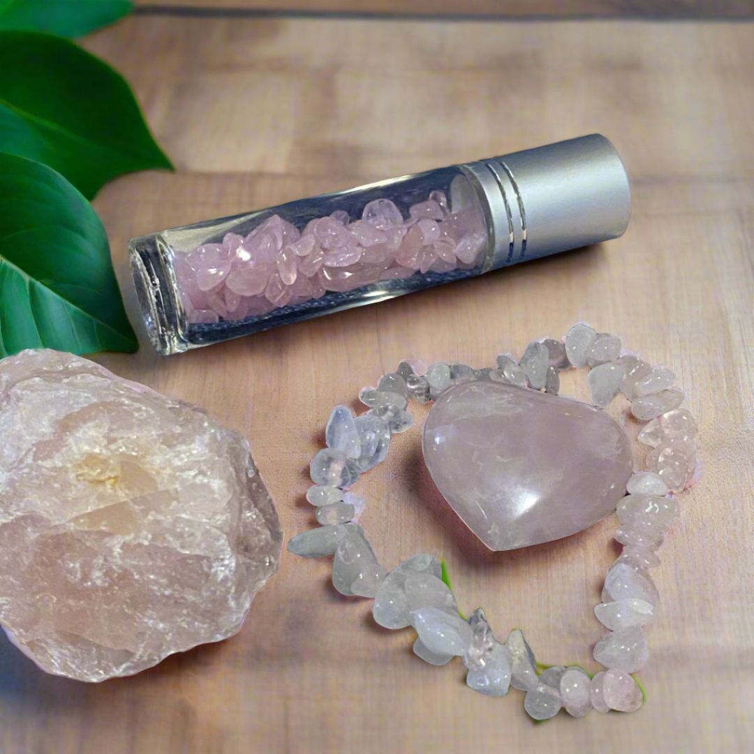 Rose Quartz Crystal Gift Bundle - 1 x Rose Quartz Raw Cluster 1 x Rose Quartz Chip Bracelet 1 x Rose Quartz Oil Roller Bottle 1 x Rose Quartz Puff Heart 